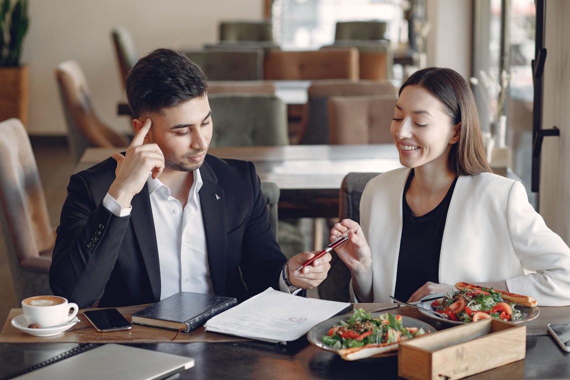 stylish-businessman-working-office-use-phone
